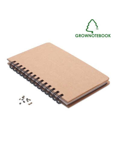 Cuadernos de papel con semillas y hojas rayadas